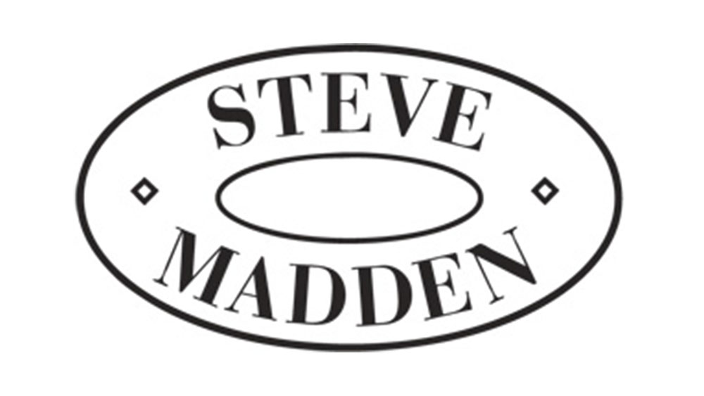 Steve Madden logo in bold oval design representing fashionable and modern eyewear styles - Hometown Eyecare